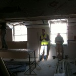 watching the plasterer